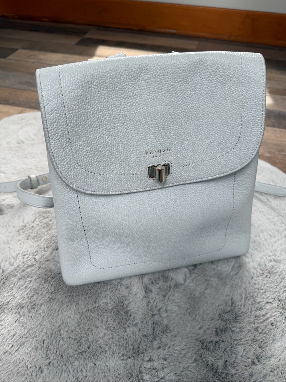 Kate Spade twist lock leather backpack